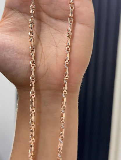 Cadena rústica con cristales oro rosa